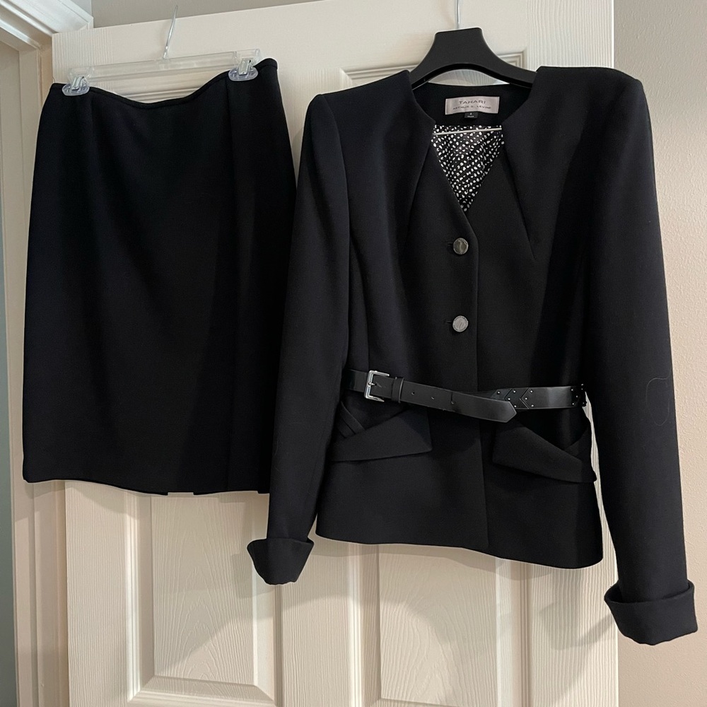 Tahari woman’s suit.